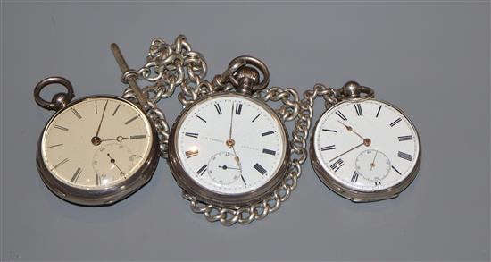 An Edwardian silver pocket watch, retailed by Yabsley, London, on a silver albert and two other pocket watches
